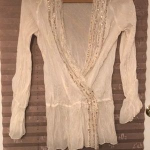 Metallic sequined shear blouse.